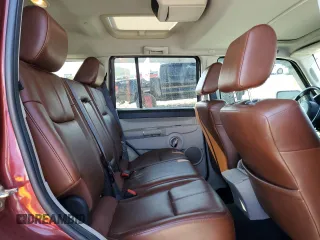 2007 Jeep Commander Limited z VIN 1J8HG58257C610852, wystawiony jako Copart lot #49461225 z przebiegiem 91 125 mil mil oraz Szkoda całkowita • Salvage title. Historia ofert i sprzedaży dostępna na DreamBid. Obrazek 11.