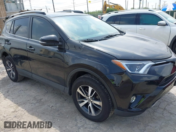 2018 Toyota RAV4 XLE z VIN 2T3WFREV4JW495379, wystawiony jako IAAI lot #42406849 z przebiegiem 132 126 mil mil oraz . Historia ofert i sprzedaży dostępna na DreamBid. Obrazek 1.