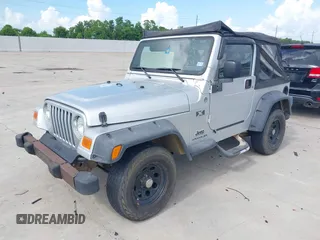 2005 Jeep Wrangler X with VIN 1J4FA39S75P321815, listed as a IAAI auction lot 42736150 with 141,914 mi miles and . Bid and sale history available at DreamBid. Image 2.
