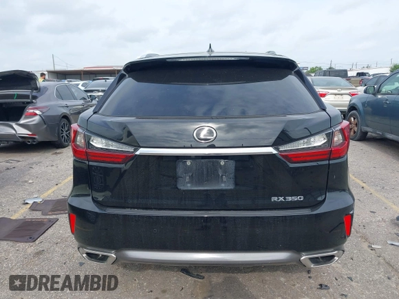2018 Lexus RX 350 z VIN 2T2ZZMCA1JC103844, wystawiony jako IAAI lot #42138509 z przebiegiem 118 754 mil mil oraz . Historia ofert i sprzedaży dostępna na DreamBid. Obrazek 17.