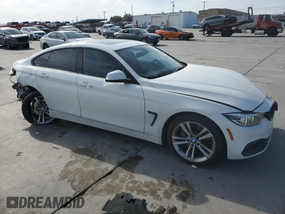 2018 BMW 4 Series 440i with VIN WBA4J5C51JBF07823, listed as a Copart auction lot 44127705 with 64,875 mi miles and Salvage Title. Bid and sale history available at DreamBid. Image 4.