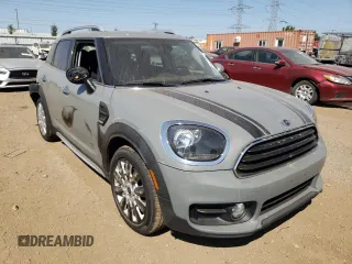 2017 MINI Countryman Cooper with VIN WMZYV5C38H3E01204, listed as a Copart auction lot 70489714 with 86,597 mi miles and Salvage Title. Bid and sale history available at carsss.com. Image 4.