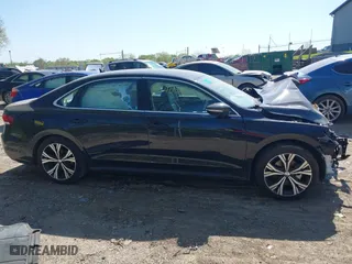 2021 Volkswagen Passat 2.0T SE with VIN 1VWSA7A32MC015219, listed as a IAAI auction lot 39240566 with 68,095 mi miles. Bid and sale history available at carsss.com. Image 14.