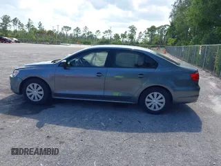2014 Volkswagen Jetta S z VIN 3VW2K7AJ3EM221290, wystawiony jako IAAI lot #42310867 z przebiegiem 118 062 mil mil oraz . Historia ofert i sprzedaży dostępna na DreamBid. Obrazek 15.