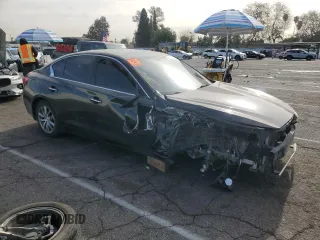 2015 Infiniti Q50 Premium with VIN JN1BV7AP5FM331451, listed as a Copart auction lot 63052025 with Not provided miles and Salvage title. Bid and sale history available at DreamBid. Image 4.