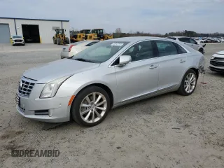 2014 Cadillac XTS Luxury z VIN 2G61M5S38E9119220, wystawiony jako Copart lot #47013715 z przebiegiem 129 360 mil mil oraz Szkody całkowita. Historia ofert i sprzedaży dostępna na DreamBid. Obrazek 1.