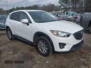 2016 Mazda CX-5 Touring with VIN JM3KE2CY5G0791537, listed as a IAAI auction lot 41396276 with 42,095 mi miles. Bid and sale history available at carsss.com. Image 1.