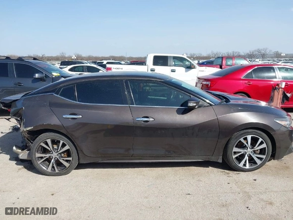 2016 Nissan Maxima 3.5 Platinum with VIN 1N4AA6AP2GC385723, listed as a IAAI auction lot 41753328 with 162,845 mi miles. Bid and sale history available at carsss.com. Image 13.
