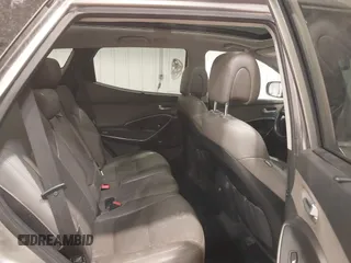 2017 Hyundai Santa Fe 2.4L z VIN 5XYZUDLBXHG447389, wystawiony jako IAAI lot #42249551 z przebiegiem 178 084 mil mil oraz . Historia ofert i sprzedaży dostępna na DreamBid. Obrazek 8.