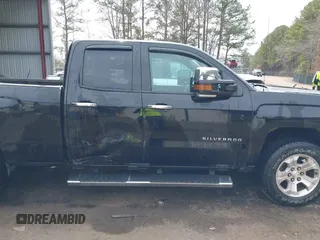 2014 Chevrolet Silverado 1500 LT with VIN 1GCVKREC4EZ110415, listed as a IAAI auction lot 41711383 with 100,344 mi miles and . Bid and sale history available at DreamBid. Image 13.