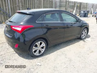 2014 Hyundai Elantra GT with VIN KMHD35LH5EU171894, listed as a IAAI auction lot 42123853 with 97,541 mi miles. Bid and sale history available at carsss.com. Image 4.