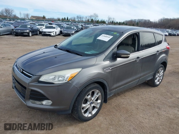 2013 Ford Escape SEL with VIN 1FMCU0HX0DUD71088, listed as a IAAI auction lot 41880044 with 155,439 mi miles. Bid and sale history available at carsss.com. Image 17.