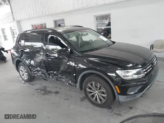 2019 Volkswagen Tiguan S with VIN 3VV1B7AX1KM073074, listed as a IAAI auction lot 41387775 with 57,045 mi miles. Bid and sale history available at carsss.com. Image 13.