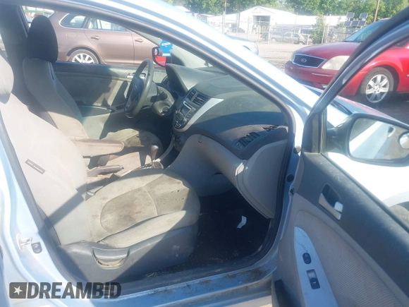 2013 Hyundai Accent GS with VIN KMHCT5AE4DU119904, listed as a IAAI auction lot 42230062 with 176,841 mi miles and . Bid and sale history available at DreamBid. Image 5.