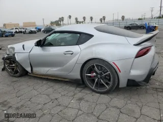 2022 Toyota GR Supra 3.0 with VIN WZ1DB0C0XNW051678, listed as a Copart auction lot 54990484 with 0 mi miles. Bid and sale history available at carsss.com. Image 2.