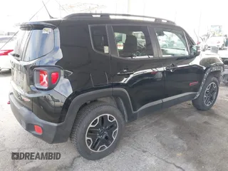 2016 Jeep Renegade Trailhawk z VIN ZACCJBCT0GPD76536, wystawiony jako IAAI lot #42341470 z przebiegiem 158 091 mil mil oraz . Historia ofert i sprzedaży dostępna na DreamBid. Obrazek 4.