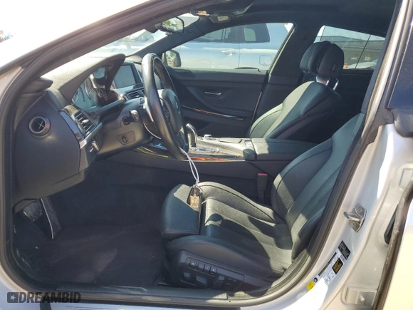 2013 BMW 6 Series 640i with VIN WBA6A0C5XDDZ03833, listed as a Copart auction lot 73165704 with 77,471 mi miles and Salvage Title. Bid and sale history available at carsss.com. Image 7.