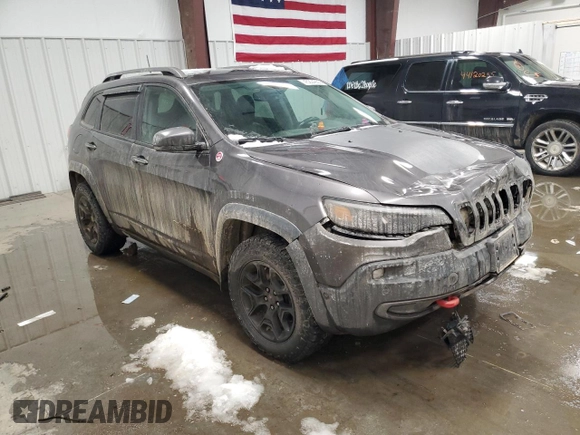 2019 Jeep Cherokee Trailhawk Elite with VIN 1C4PJMBX4KD138598, listed as a Copart auction lot 45204255 with 135,557 mi miles and Salvage Title. Bid and sale history available at carsss.com. Image 4.