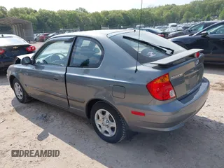 2003 Hyundai Accent GL z VIN KMHCG35CX3U243322, wystawiony jako IAAI lot #42277841 z przebiegiem 45 855 mil mil oraz . Historia ofert i sprzedaży dostępna na DreamBid. Obrazek 3.