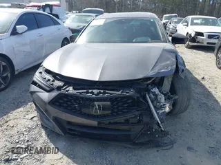 2022 Acura TLX w/A-Spec Package z VIN 19UUB5F53NA002629, wystawiony jako IAAI lot #41836622 z przebiegiem 51 815 mil mil oraz . Historia ofert i sprzedaży dostępna na DreamBid. Obrazek 12.