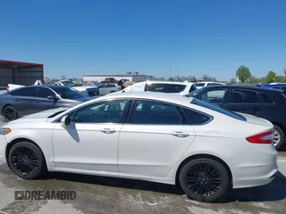 2014 Ford Fusion SE with VIN 3FA6P0HD3ER227077, listed as a IAAI auction lot 42007792 with 82,866 mi miles and . Bid and sale history available at DreamBid. Image 14.