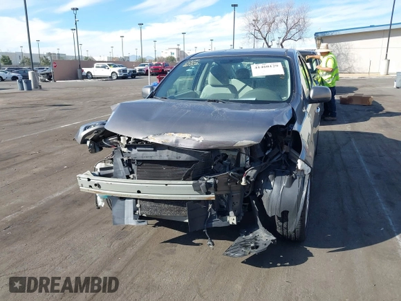 2014 Nissan Versa S with VIN 3N1CN7APXEL817010, listed as a IAAI auction lot 41460129 with 137,040 mi miles. Bid and sale history available at carsss.com. Image 6.
