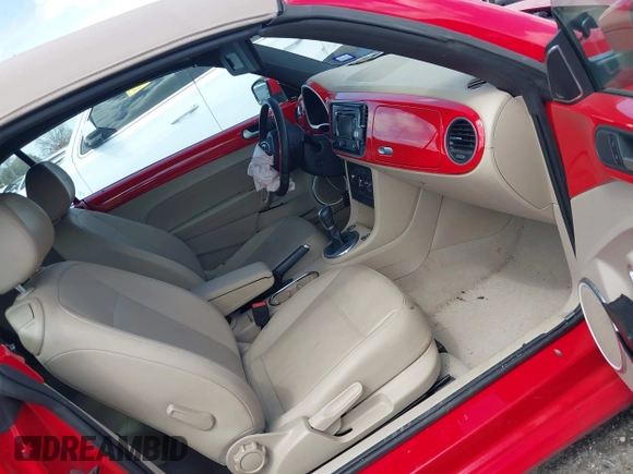 2015 Volkswagen Beetle 1.8T w/Tech with VIN 3VW517AT4FM803238, listed as a IAAI auction lot 41812373 with 42,369 mi miles and . Bid and sale history available at DreamBid. Image 5.