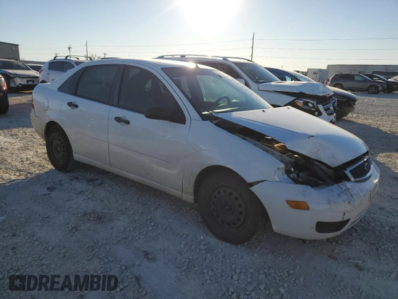 2007 Ford Focus S with VIN 1FAFP34N47W243028, listed as a Copart auction lot 55147695 with 218,672 mi miles and Salvage title. Bid and sale history available at DreamBid. Image 4.