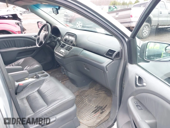 2005 Honda Odyssey EX-L with VIN 5FNRL38675B133498, listed as a IAAI auction lot 42046228 with 257,985 mi miles. Bid and sale history available at carsss.com. Image 5.