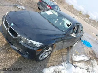 2014 BMW 3 Series 328i xDrive with VIN WBA3B3G58ENR83365, listed as a IAAI auction lot 41684711 with 141,669 mi miles. Bid and sale history available at carsss.com. Image 2.