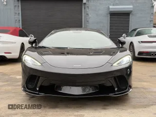 2023 McLaren GT z VIN SBM22GCA3PW002548, wystawiony jako Copart lot #52157855 z przebiegiem 779 mil mil oraz Szkody całkowita. Historia ofert i sprzedaży dostępna na DreamBid. Obrazek 14.
