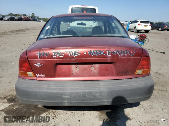 1997 Saturn SL with VIN 1G8ZF5285VZ412630, listed as a Copart auction lot 74937694 with 165,371 mi miles and Salvage Title. Bid and sale history available at carsss.com. Image 6.