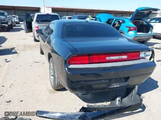 2014 Dodge Challenger SXT with VIN 2C3CDYAGXEH257685, listed as a IAAI auction lot 41626974 with 87,594 mi miles. Bid and sale history available at carsss.com. Image 3.