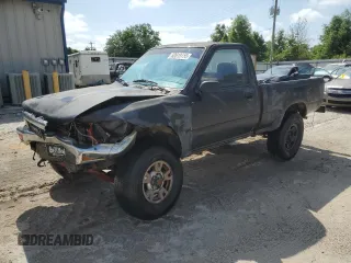 1989 Toyota Pickup DX z VIN JT4RN01P0K4009930, wystawiony jako Copart lot #52619155 z przebiegiem Nie podano mil oraz Szkoda całkowita • Salvage title. Historia ofert i sprzedaży dostępna na DreamBid. Obrazek 1.