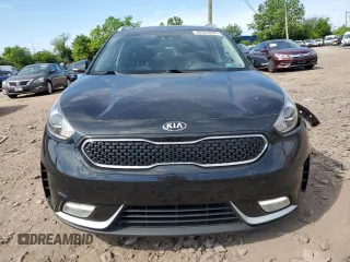 2017 Kia Niro Touring with VIN KNDCE3LC4H5072016, listed as a Copart auction lot 58342094 with 83,163 mi miles and Salvage Title. Bid and sale history available at carsss.com. Image 5.