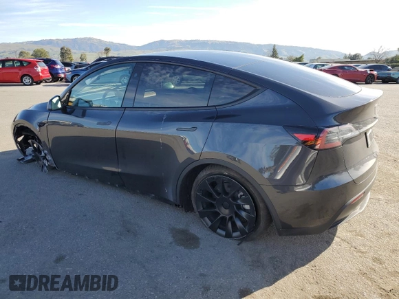 2025 Tesla Model Y Long Range with VIN 7SAYGDEE4SF272942, listed as a Copart auction lot 45817885 with 2,308 mi miles and Salvage Title. Bid and sale history available at DreamBid. Image 2.
