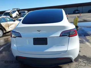 2022 Tesla Model Y Long Range with VIN 7SAYGDEE1NF402745, listed as a IAAI auction lot 41493850 with 11,222 mi miles and . Bid and sale history available at DreamBid. Image 16.