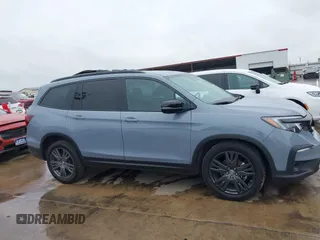 2022 Honda Pilot Sport z VIN 5FNYF5H34NB019222, wystawiony jako IAAI lot #41905708 z przebiegiem 143 397 mil mil oraz . Historia ofert i sprzedaży dostępna na DreamBid. Obrazek 13.