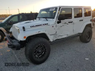 2015 Jeep Wrangler Unlimited Rubicon with VIN 1C4BJWFG5FL659017, listed as a Copart auction lot 84435034 with 69,915 mi miles and Salvage Title. Bid and sale history available at carsss.com. Image 1.