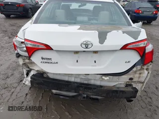 2015 Toyota Corolla L with VIN 5YFBURHE4FP330420, listed as a IAAI auction lot 41059296 with 73,689 mi miles and . Bid and sale history available at DreamBid. Image 6.