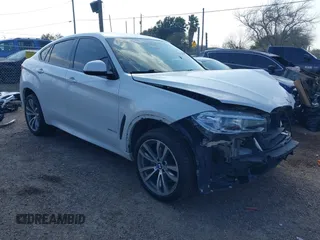 2018 BMW X6 xDrive35i with VIN 5UXKU2C55J0X49585, listed as a IAAI auction lot 41513997 with 57,204 mi miles. Bid and sale history available at carsss.com. Image 1.