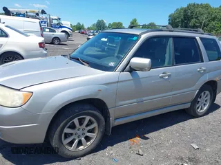 2007 Subaru Forester X with VIN JF1SG65617H725645, listed as a IAAI auction lot 42660092 with 123,228 mi miles and . Bid and sale history available at DreamBid. Image 6.