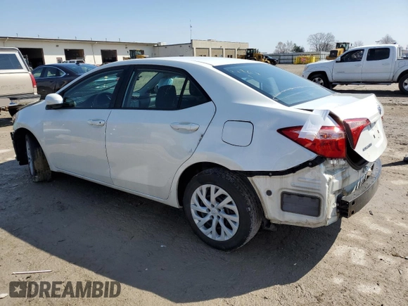 2019 Toyota Corolla L with VIN 5YFBURHE8KP883663, listed as a Copart auction lot 52443625 with 150,025 mi miles and Salvage Title. Bid and sale history available at DreamBid. Image 2.