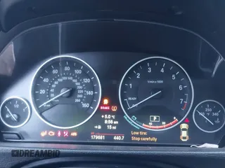 2014 BMW 4 Series 428i with VIN WBA3N7C52EF718794, listed as a IAAI auction lot 41416632 with 179,681 mi miles and . Bid and sale history available at carsss.com. Image 7.