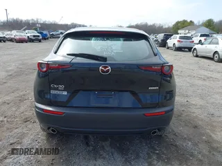 2021 Mazda CX-30 S with VIN 3MVDMBAL5MM214185, listed as a IAAI auction lot 41800888 with 33,267 mi miles and . Bid and sale history available at carsss.com. Image 16.
