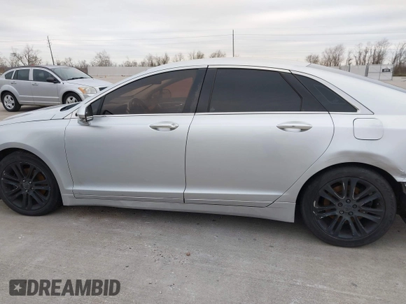 2015 Lincoln MKZ with VIN 3LN6L2J98FR618486, listed as a IAAI auction lot 41328946 with 167,211 mi miles and . Bid and sale history available at DreamBid. Image 14.