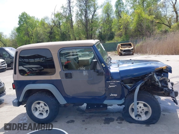 2000 Jeep Wrangler Sport with VIN 1J4FA49S5YP750123, listed as a IAAI auction lot 42060009 with Not Provided miles. Bid and sale history available at carsss.com. Image 13.