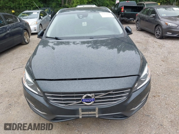 2015 Volvo V60 with VIN YV1612SB3F1192139, listed as a IAAI auction lot 42471036 with 104,935 mi miles and . Bid and sale history available at DreamBid. Image 6.