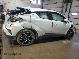 2021 Toyota C-HR LE z VIN NMTKHMBX2MR140040, wystawiony jako Copart lot #50598335 z przebiegiem Nie podano mil oraz Szkoda całkowita • Salvage title. Historia ofert i sprzedaży dostępna na DreamBid. Obrazek 3.
