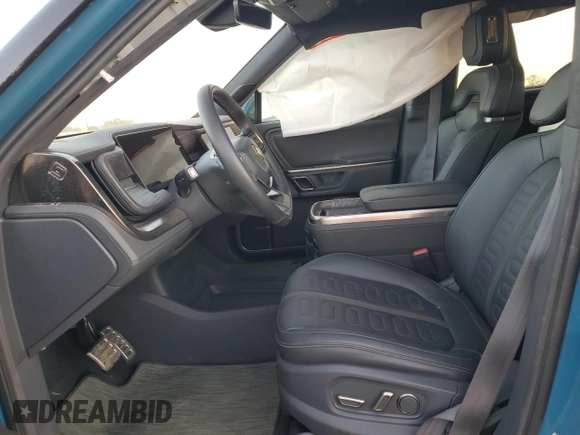 2022 Rivian R1T Launch Edition with VIN 7FCTGAAL5NN001219, listed as a Copart auction lot 86623924 with Not Provided miles and Salvage Title. Bid and sale history available at DreamBid. Image 7.